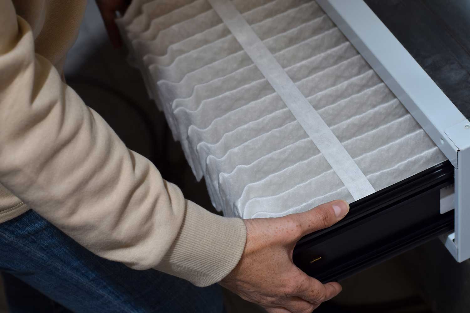 close up of an AC air filter to demonstrate the importance of changing your AC filter regularly