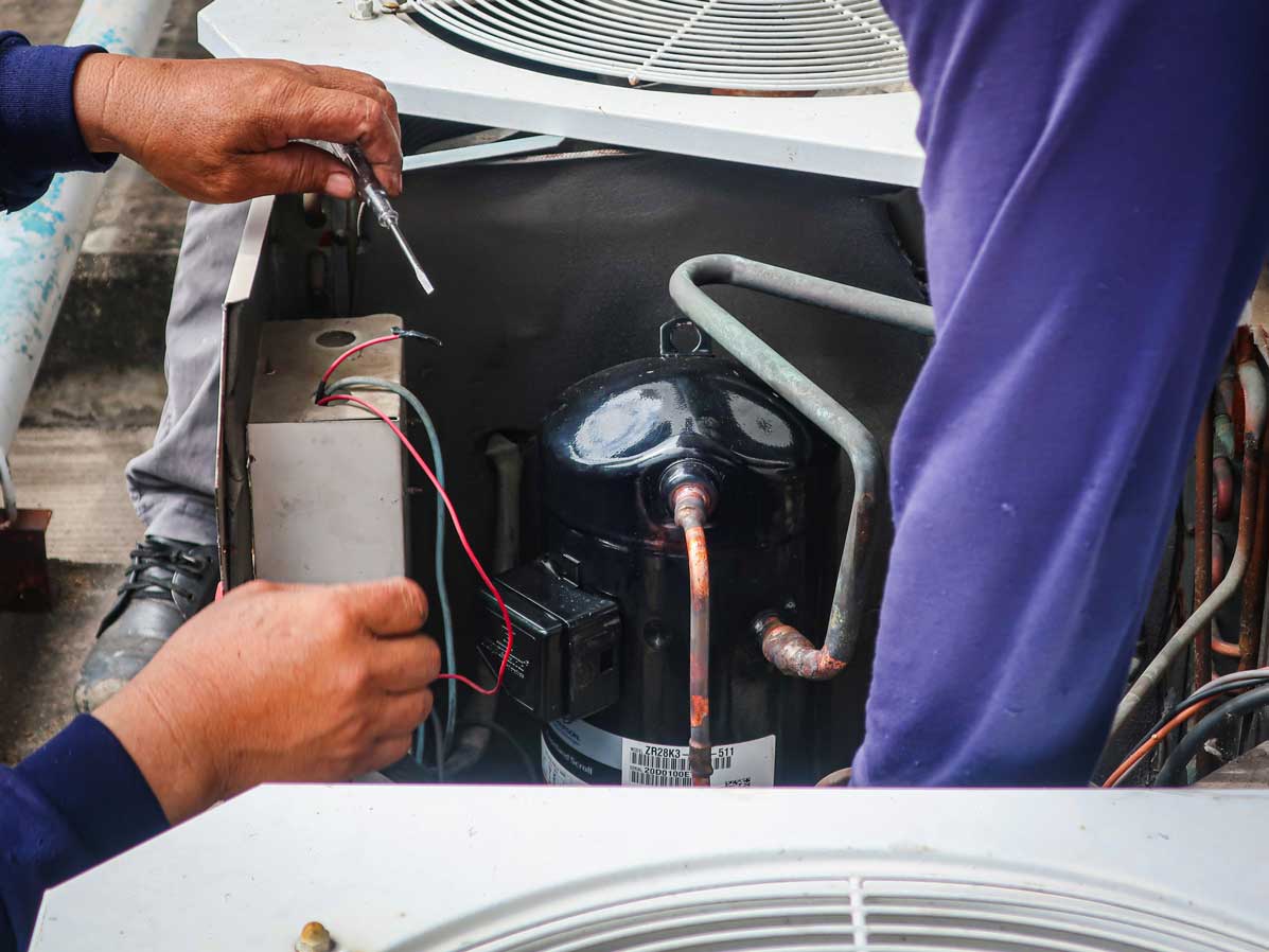 Close up of an air conditioner refrigerant, relating to the 2025 refrigerant mandate coming